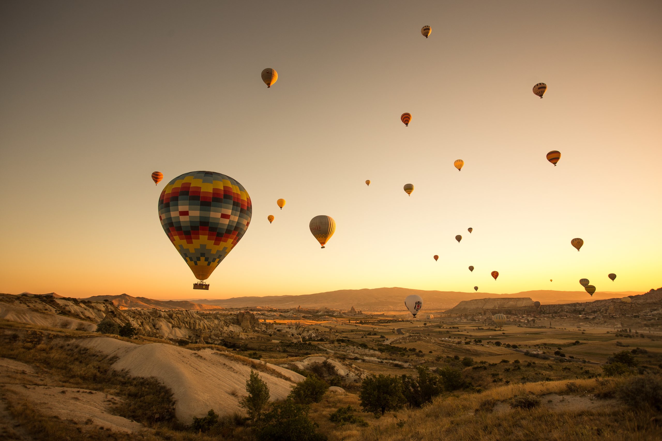 Colorful hot air balloons flying over Cappadocia, Turkey